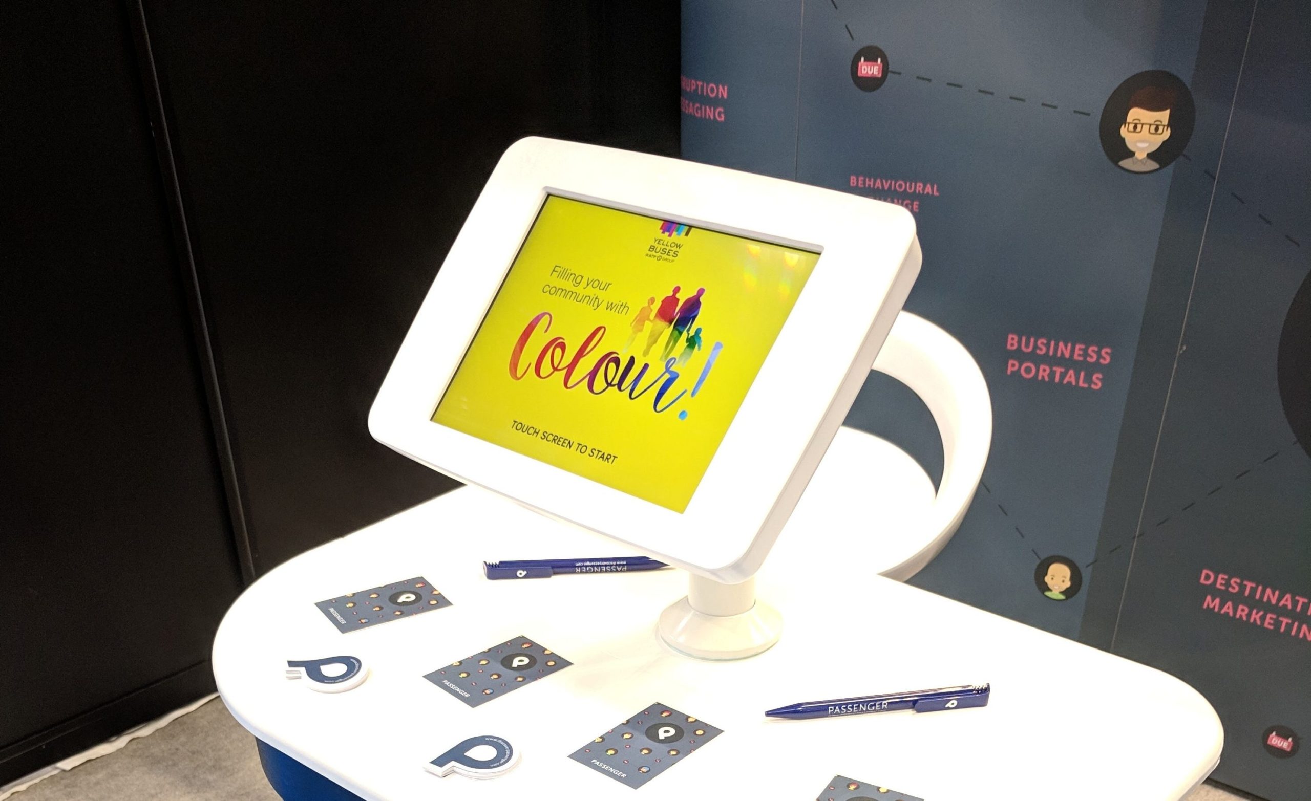 Side view of passenger kiosk displaying a home screen
