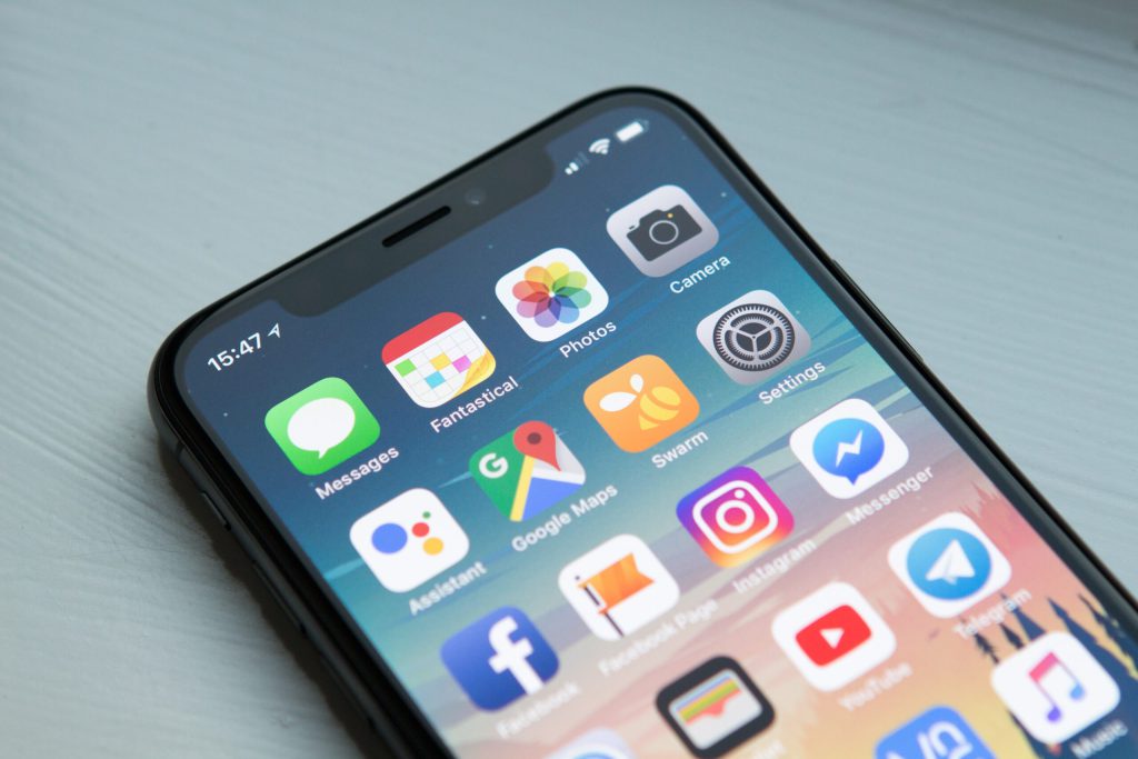 photo of phone displaying apps